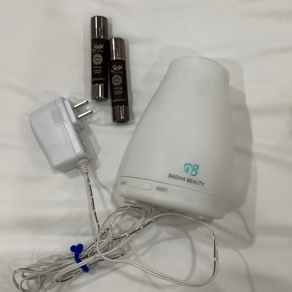 2 Saje essential oils and diffuser